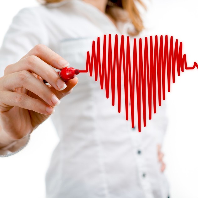 woman drawing heartbeat in red