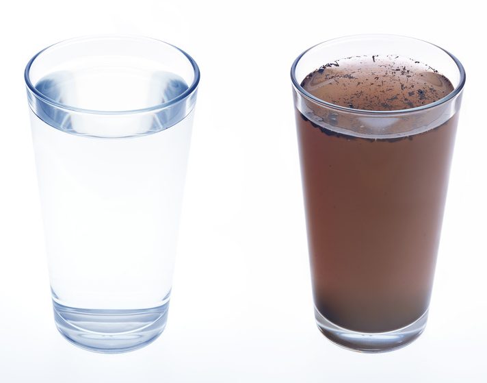 The need for detoxifying illustrated with glasses of clean and dirty water